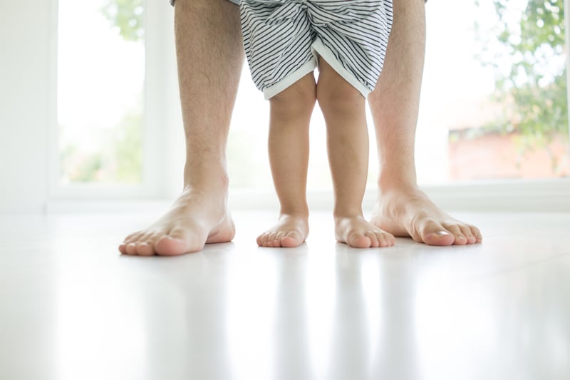 Happy father and son at home