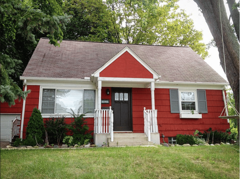A craftsman style home before an exterior facelift was completed