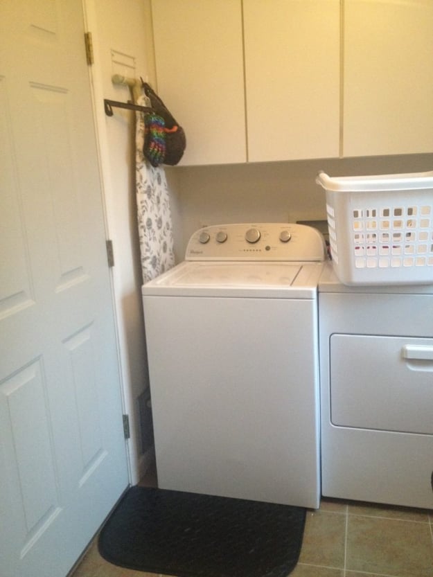 Before photo of a laundry room before remodel