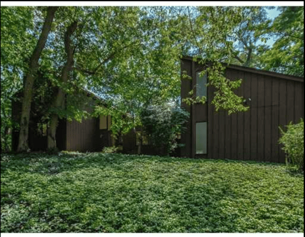 Photo of contemporary home before it went through an exterior facelift