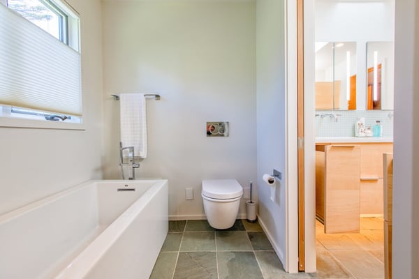 Photo of wall mounted toilet with hidden tank