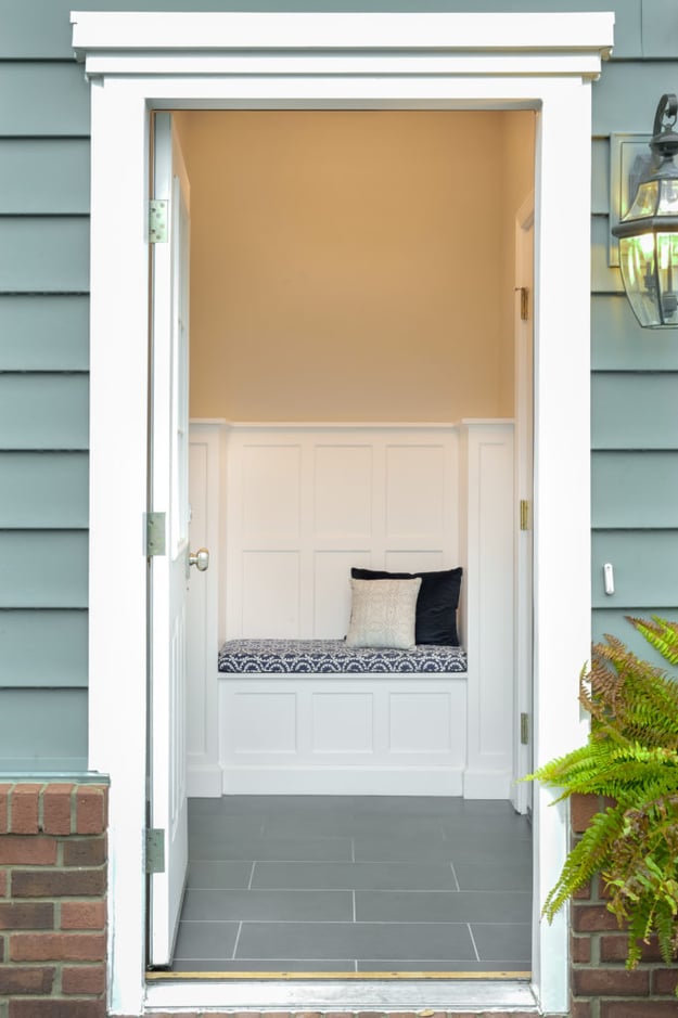 A built in bench provides storage and a place to take off your shoes