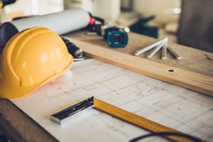 hiring-a-contractor-tools-and-hard-hat