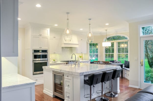 White kitchen cabinets, walls and countertops
