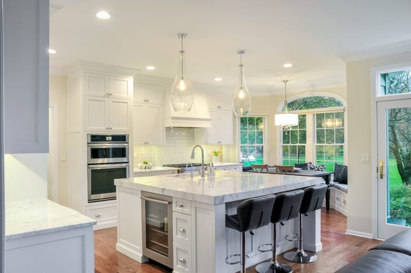 White kitchen cabinets, walls and countertops