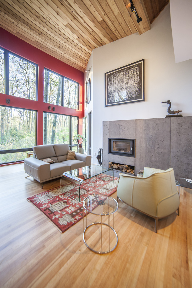 inside-2_670Interior addition with custom windows and custom concrete fireplace surround